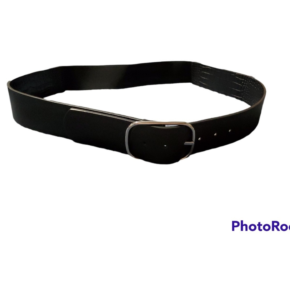 Black belt with partial stretch band size 22/24 and a silver tone buckle
